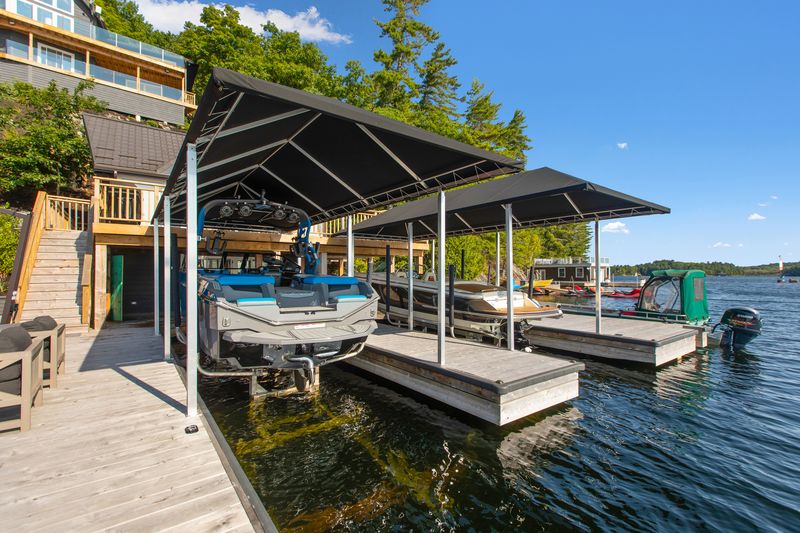 Covered dock with multiple boat lifts