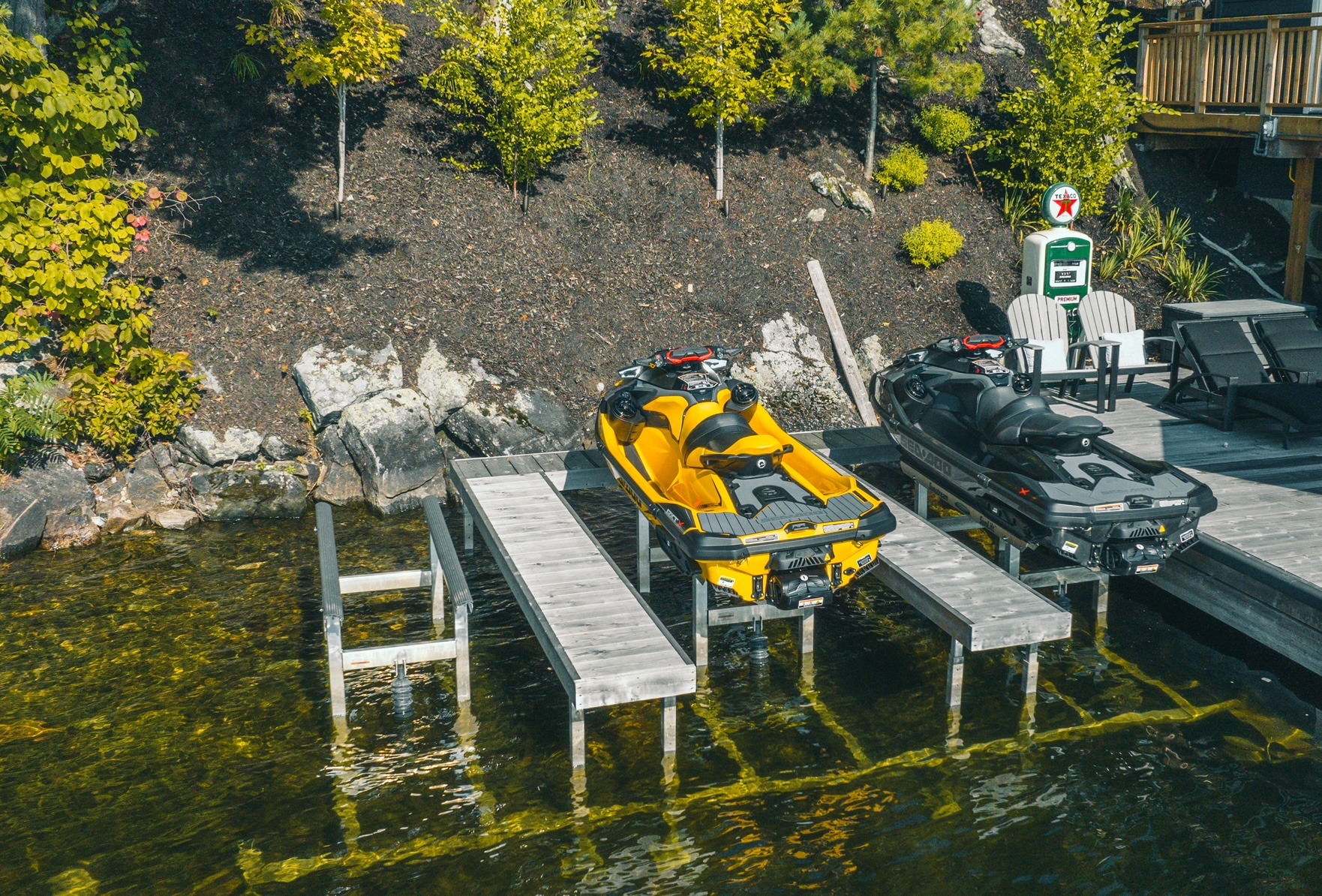 Aerial view of dual PWC dock lifts at Ontario waterfront